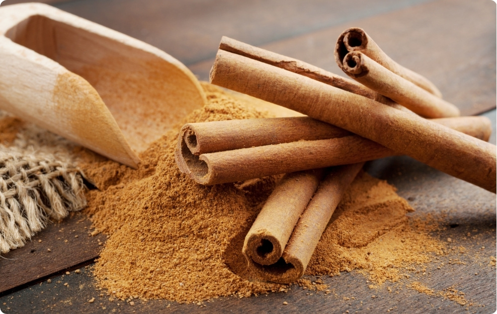 What does Cinnamon Essential oil help with?