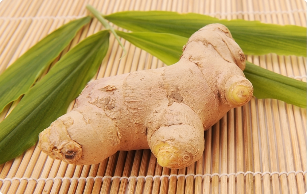 What does Ginger Essential oil help with?